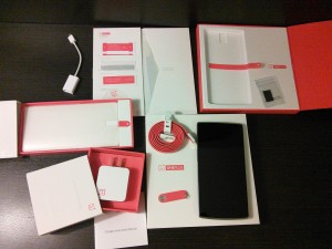 Now we are joined by the paper-thin polycarbonate case, the OTG usb cable (for keyboards and projectors), and microns thick tempered gorilla-glass screen protector.